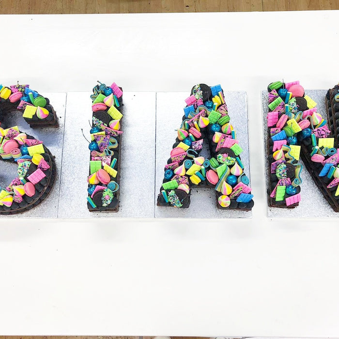LOADED LETTER CAKES