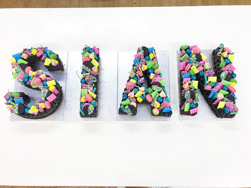 LOADED LETTER CAKES
